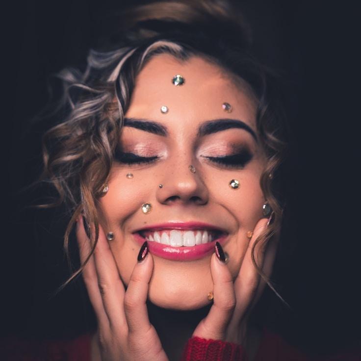 Kaveri Mehta, Lead Design Curator at Verdant & Vine, reviewing corporate floral arrangements